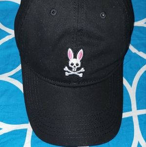 Adjustable strap cap